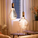 Bombilla LED Smart WiFi E27 G200 Regulable WIZ Filamento 6.7W